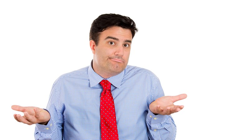 Closeup portrait of handsome businessman or worker or boss asking whats the problem, who cares, so what. Isolated on white background